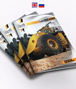 Las Zırh tire protection chain for heavy machinery in rugged terrain.